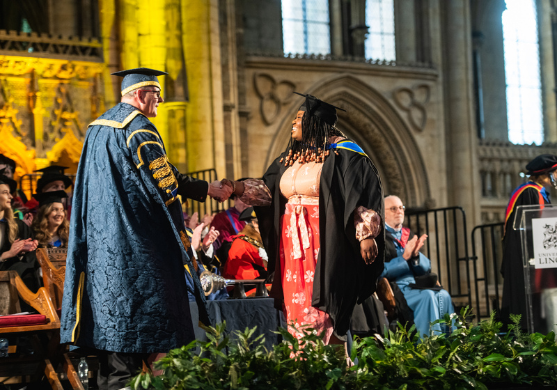 A student graduating at Lincoln Cathedral