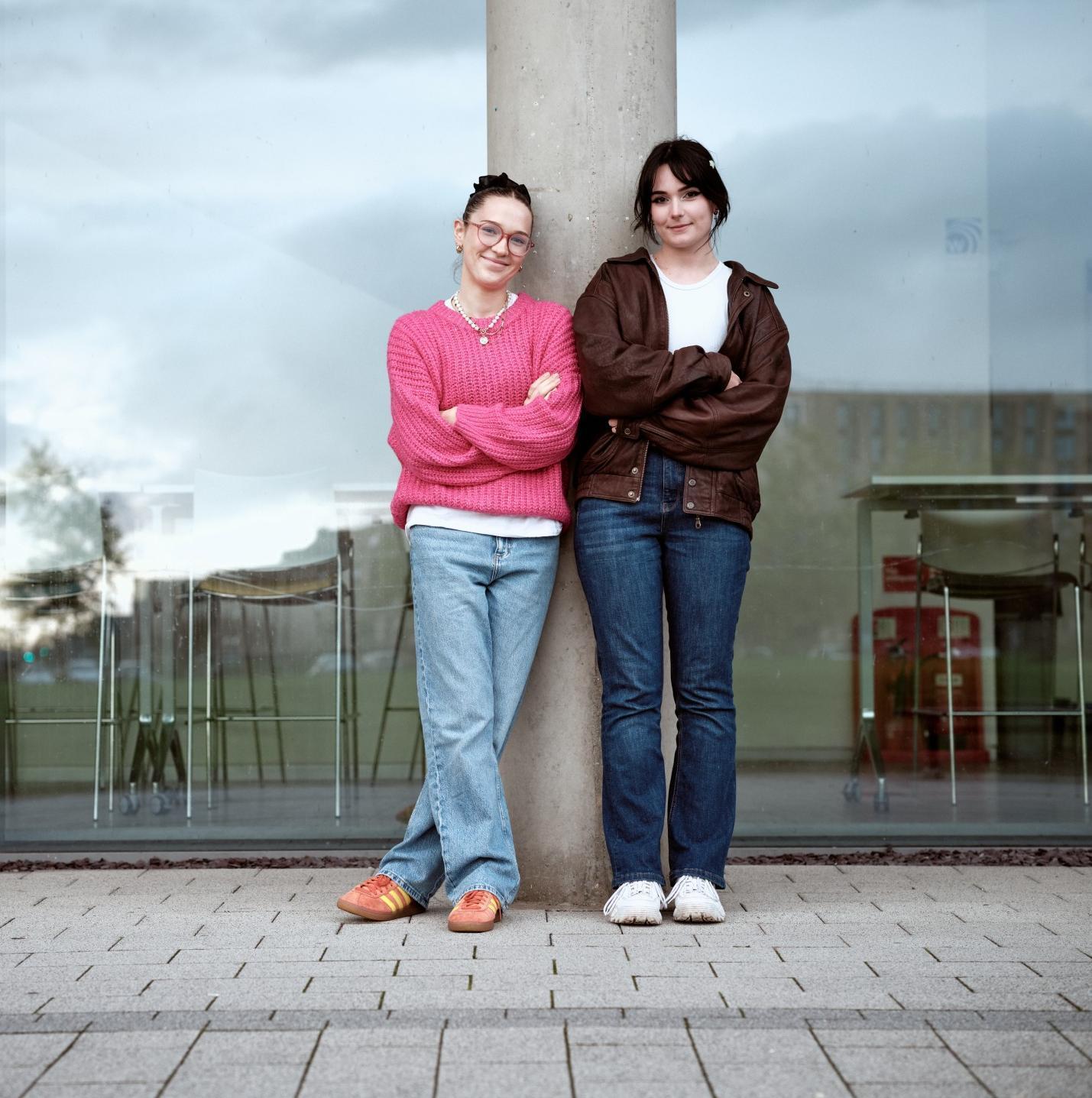Two University of Lincoln Students outside NDLH building