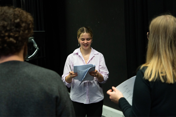 Student reading from a script