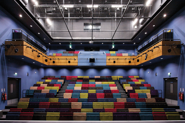 Interior of the Lincoln Performing Arts Centre main auditorium with colourful seating