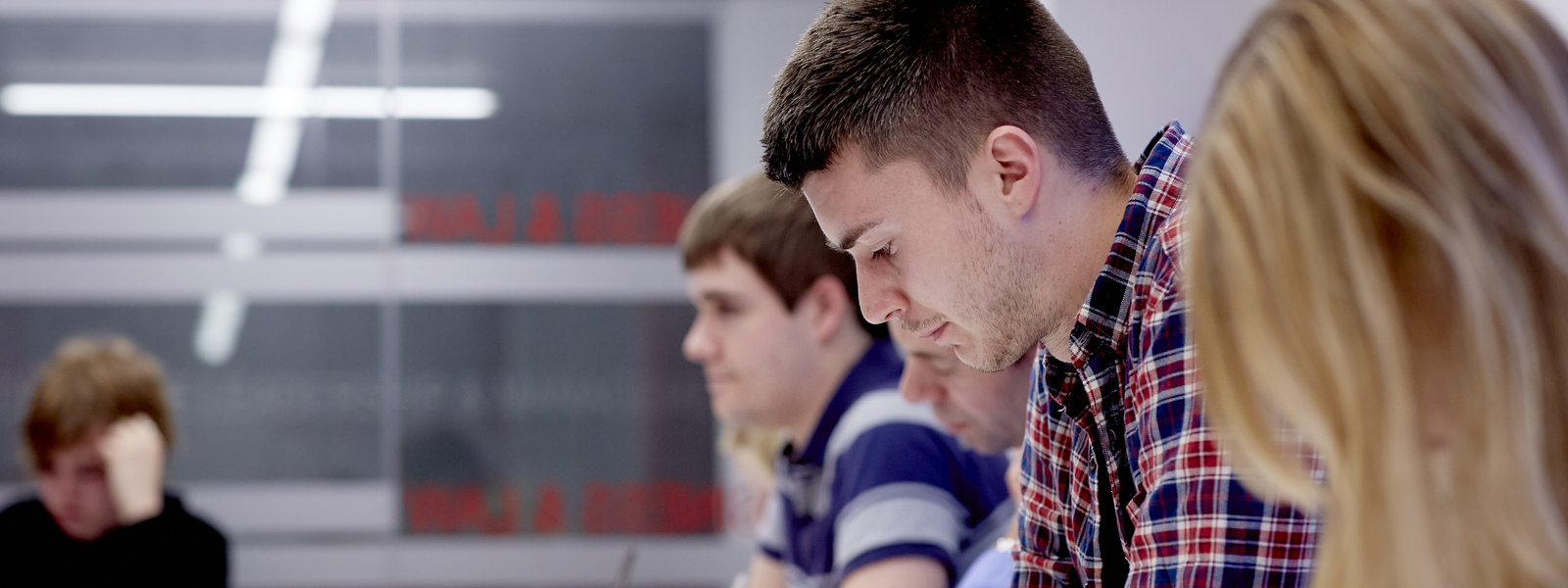 Group of students sitting in a classroom.