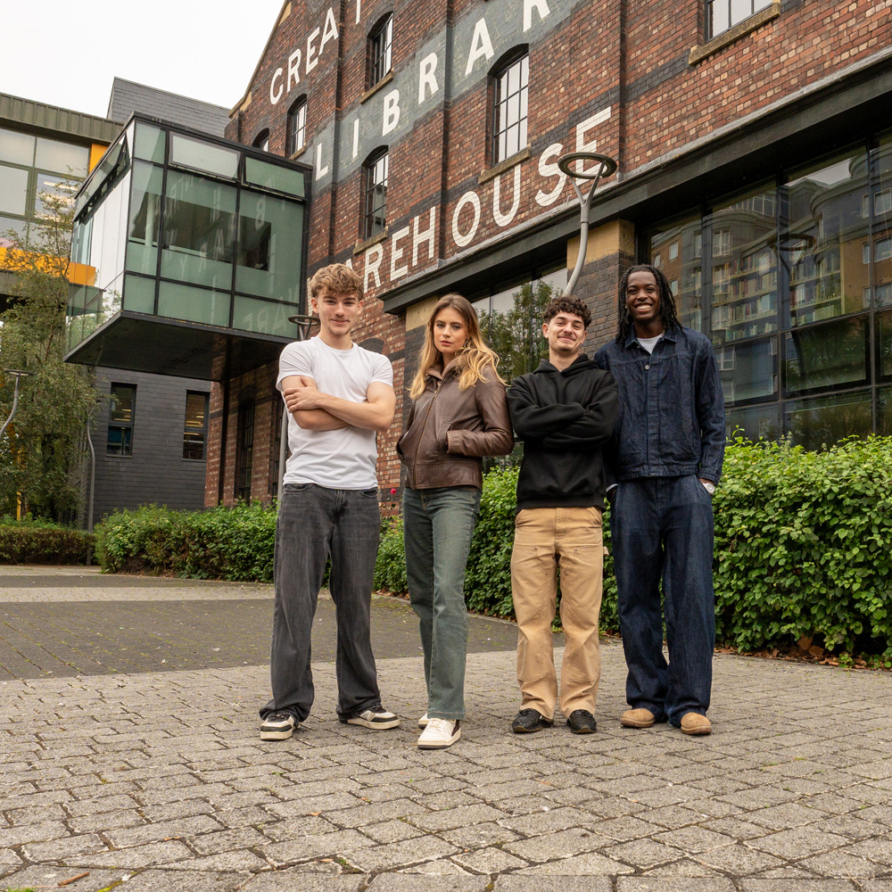 A group of students outside the university library