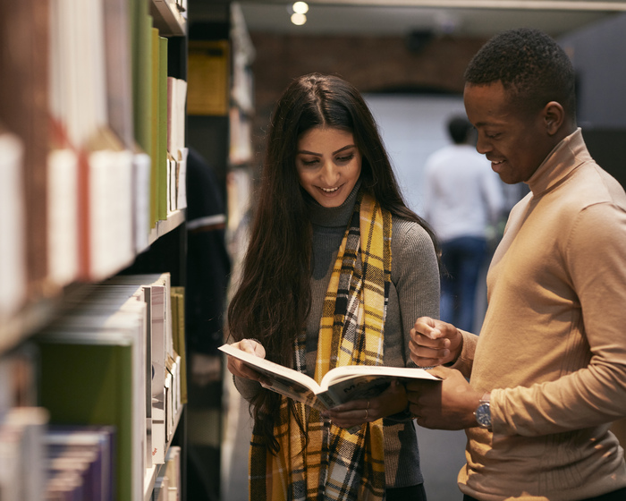 Students talking in the library