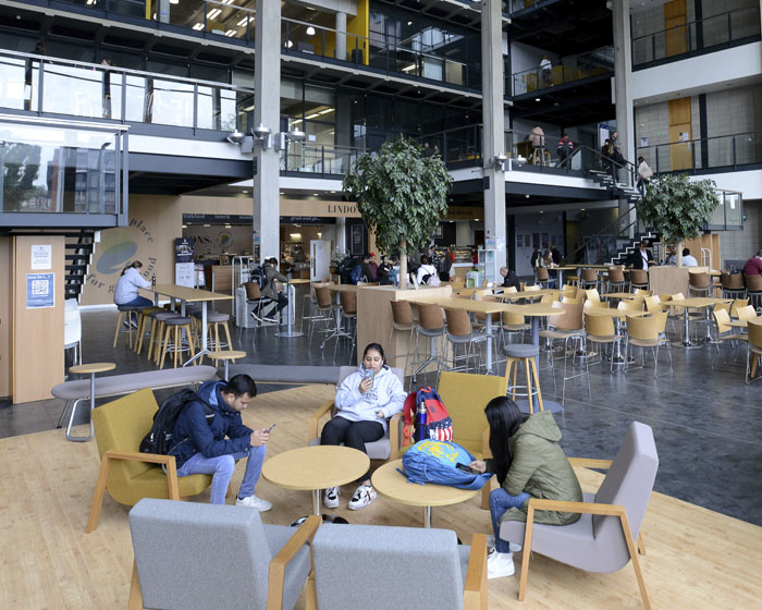 Students sitting in the Minerva Buidling catering area