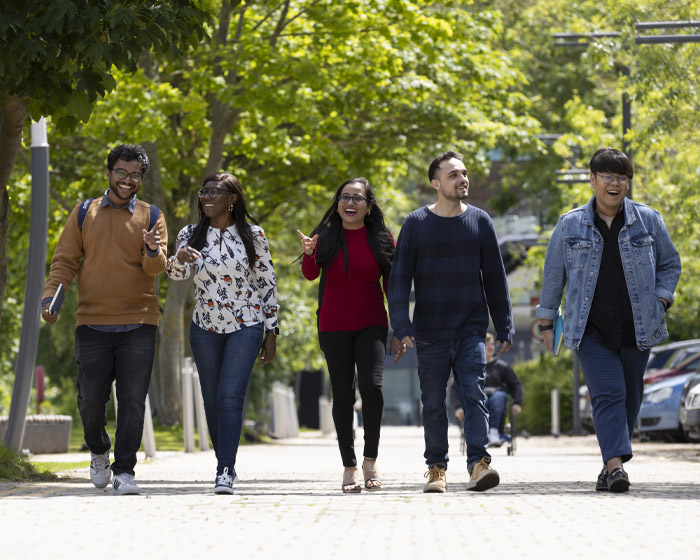 A group of students walking on Lincoln campus