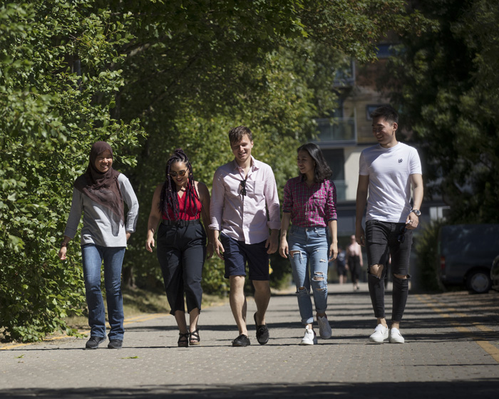 A group of students walking on campus