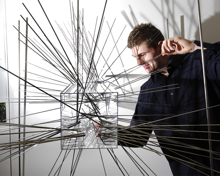 A student works on a complex design project