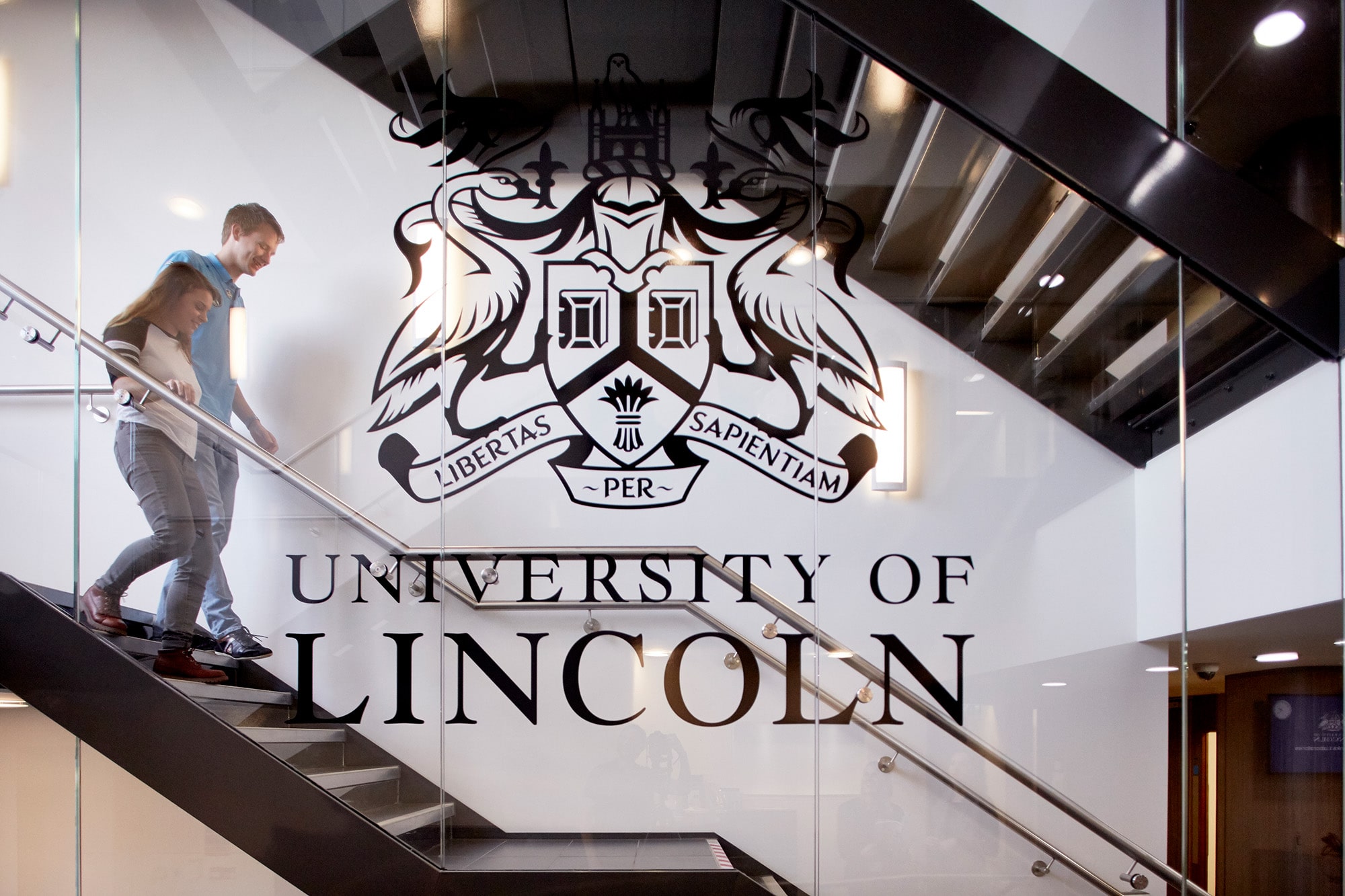 The University of Lincoln logo on glass