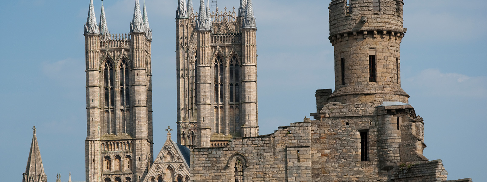 Lincoln cathedral with castle walls in the foreground