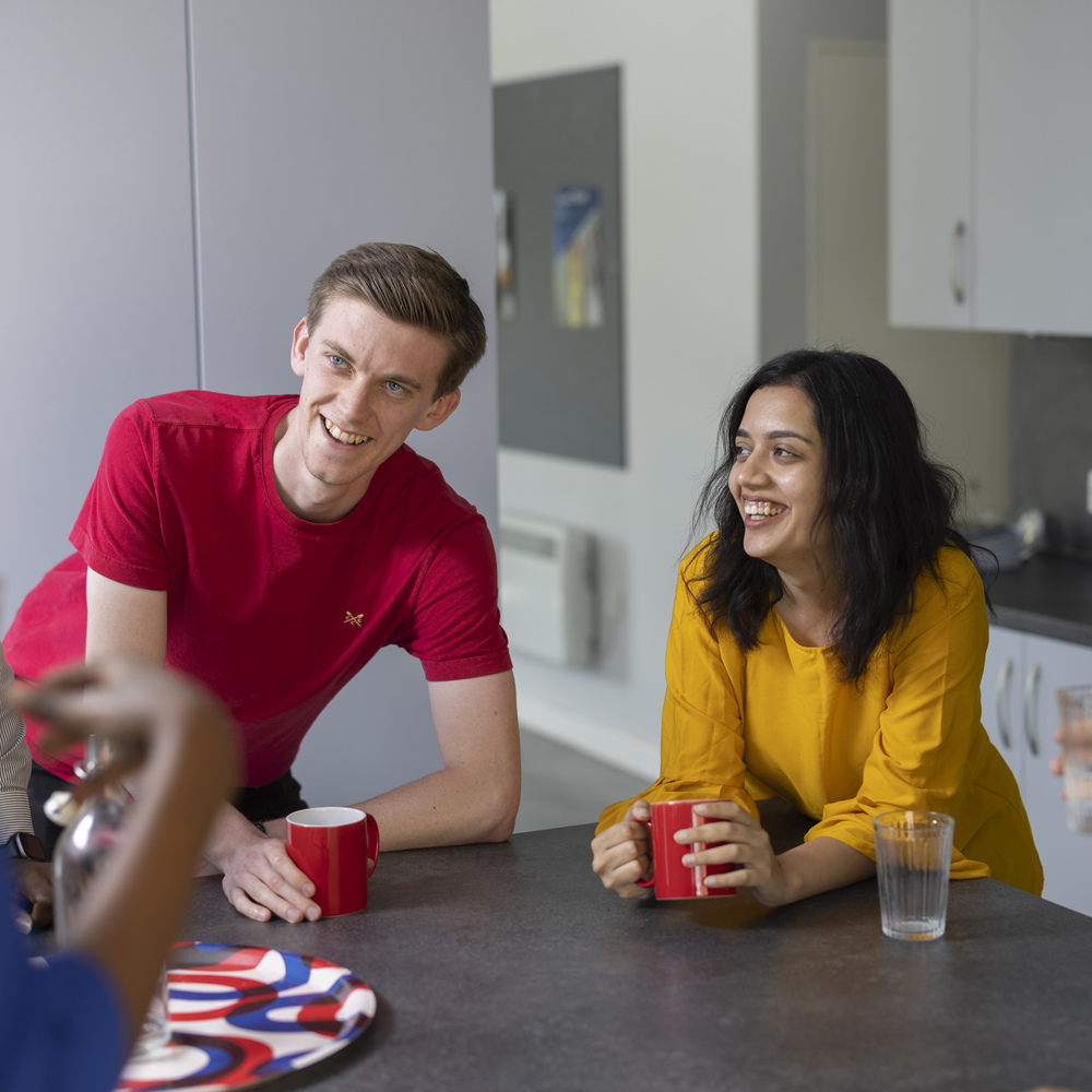 Students socialising in a kitchen