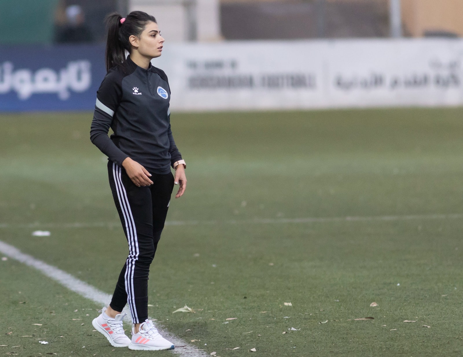 Sara Shehabi stood on a football pitch