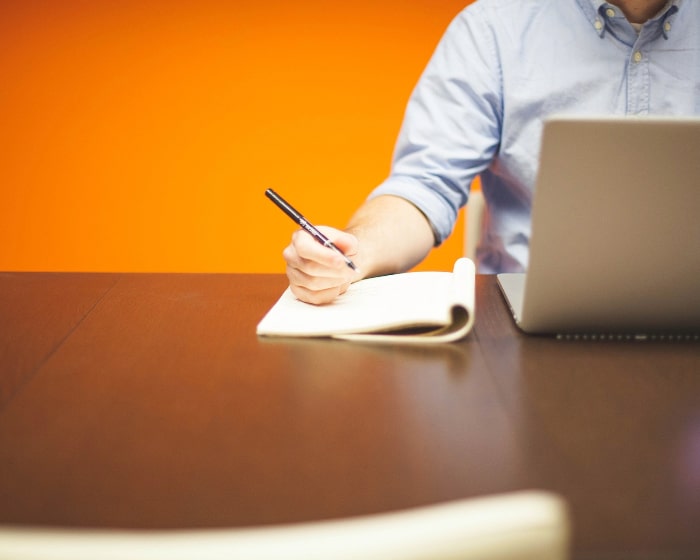 Person sat at laptop