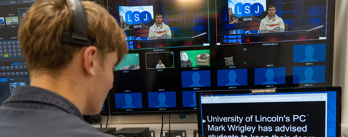 Boy in newsroom