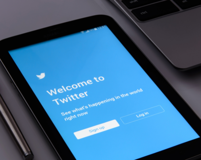 Twitter welcome page on a mobile device screen