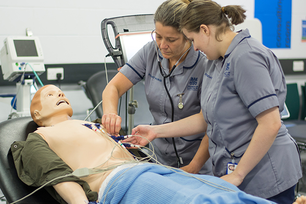 Student nurses with a sim patient