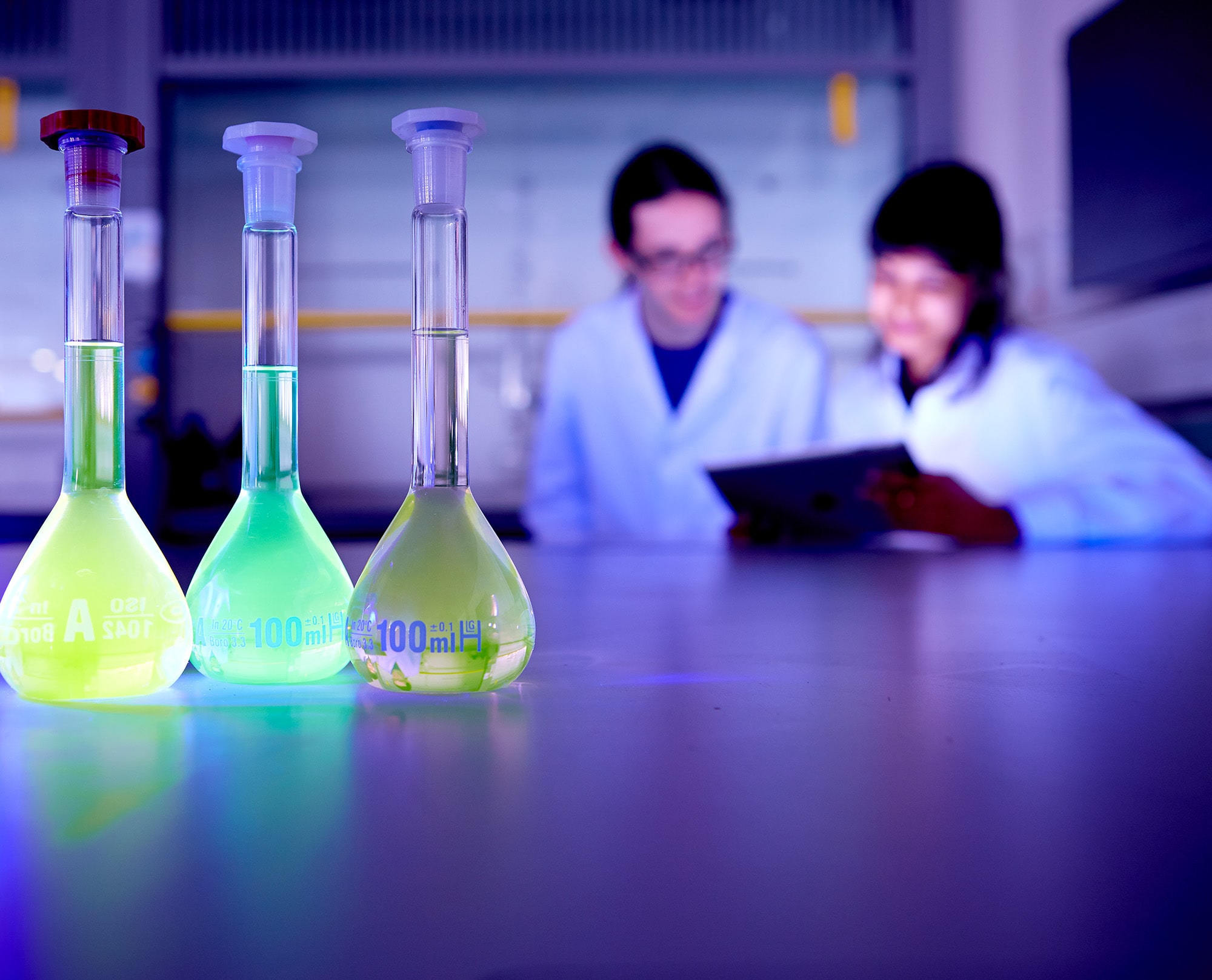 Students in a lab with chemicals
