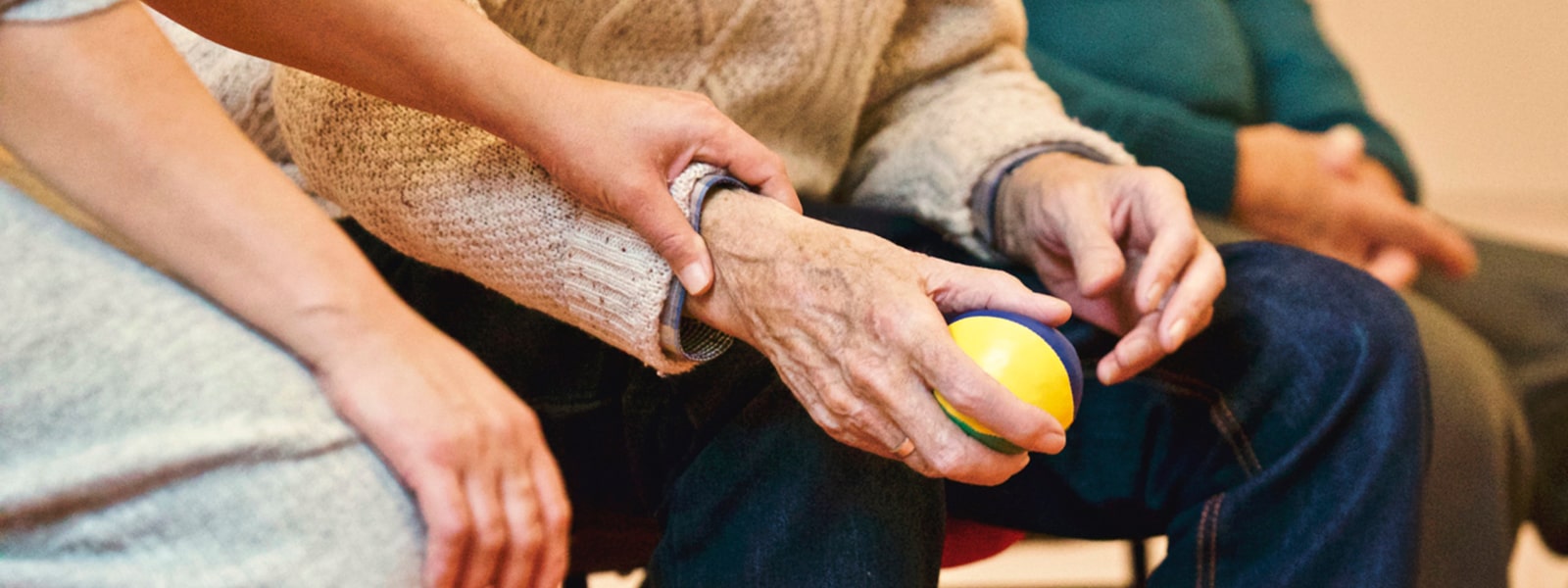 Young person holding an older person's arm