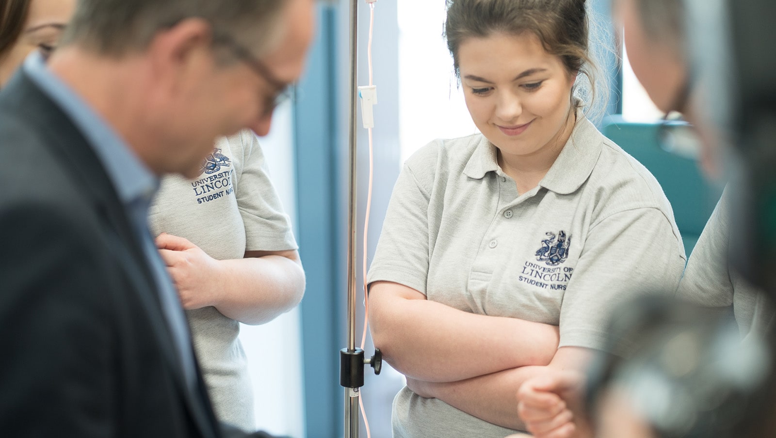 Student nurses with visitor