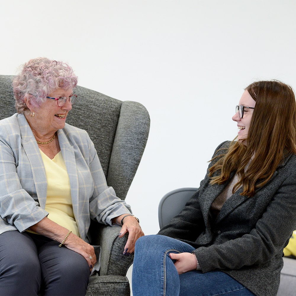 Social worker with elderly service user