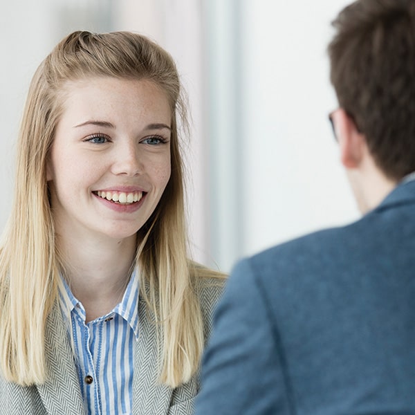Smiling student in an interview