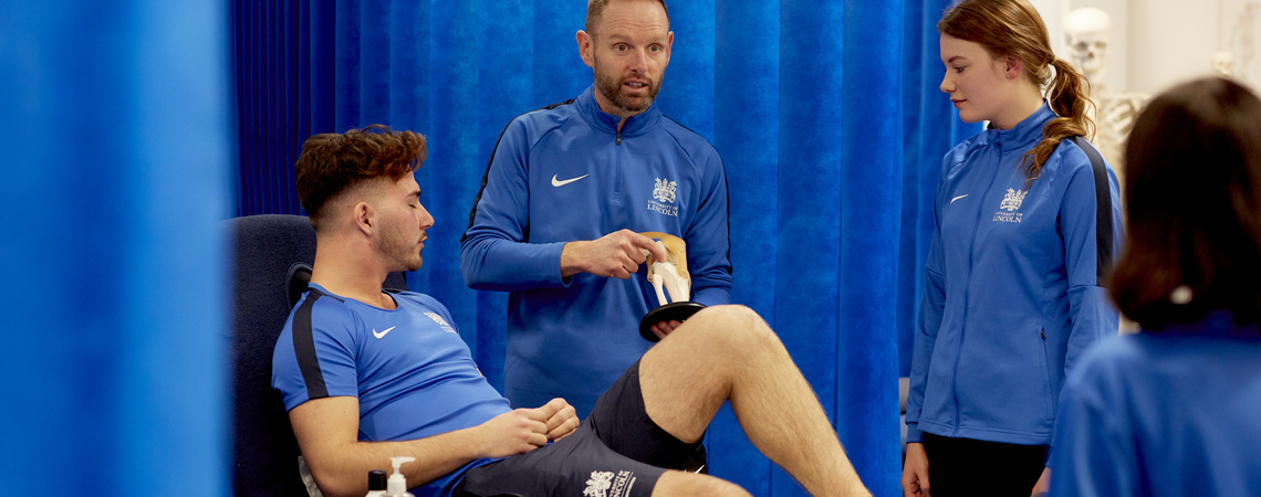 Students in a sports therapy setting