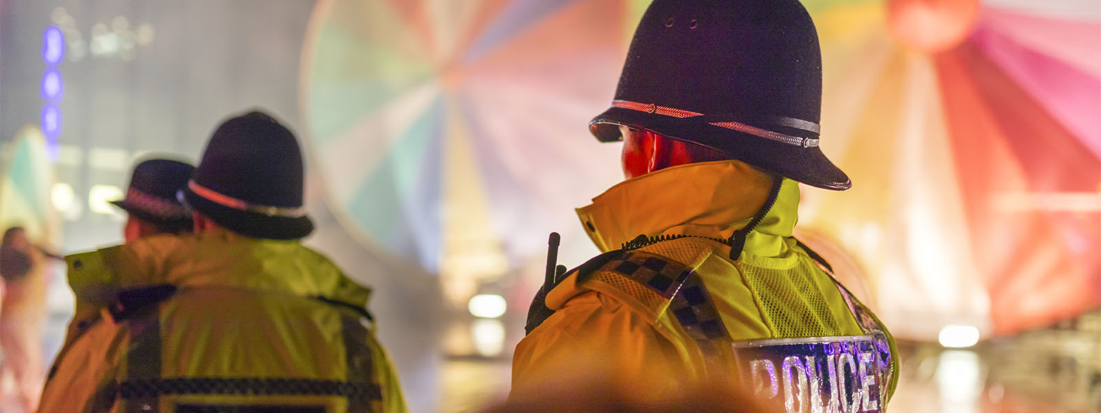 Three police officers on patrol in the City