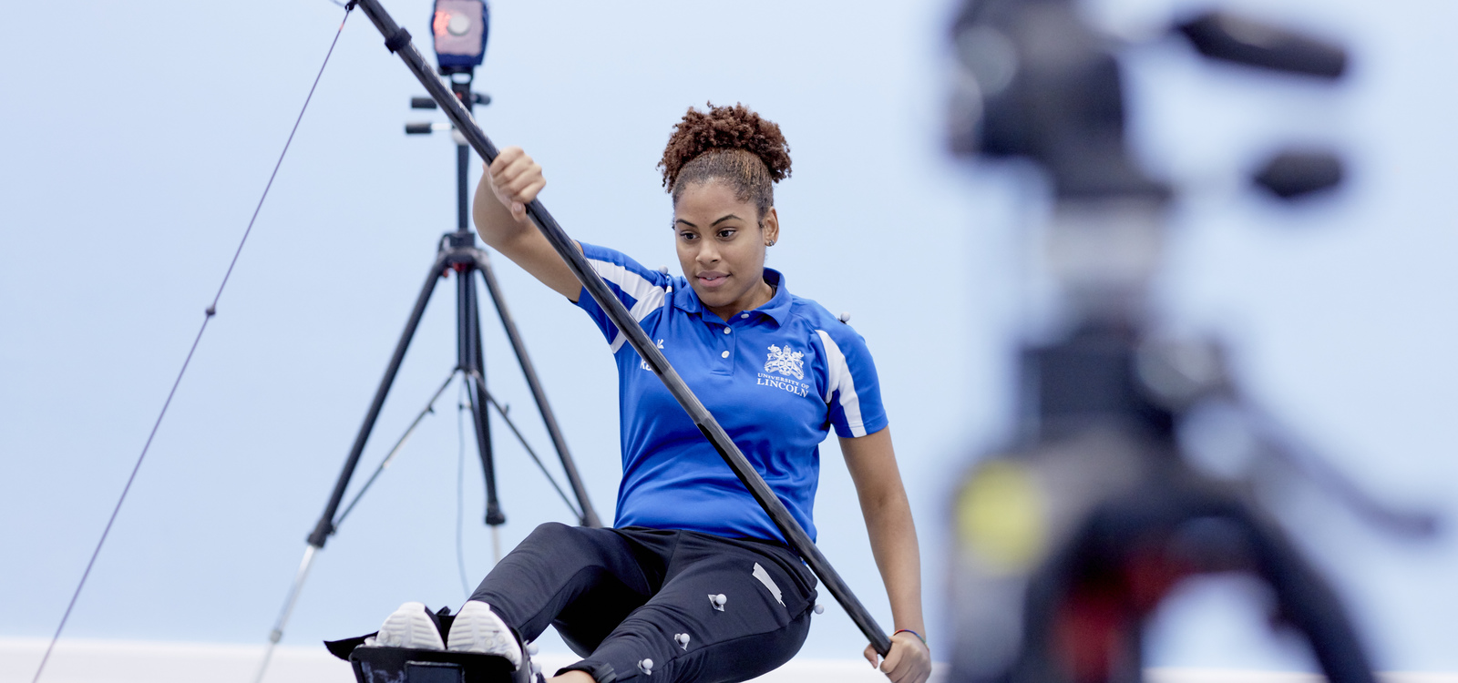 Student using technical sports equipment. 