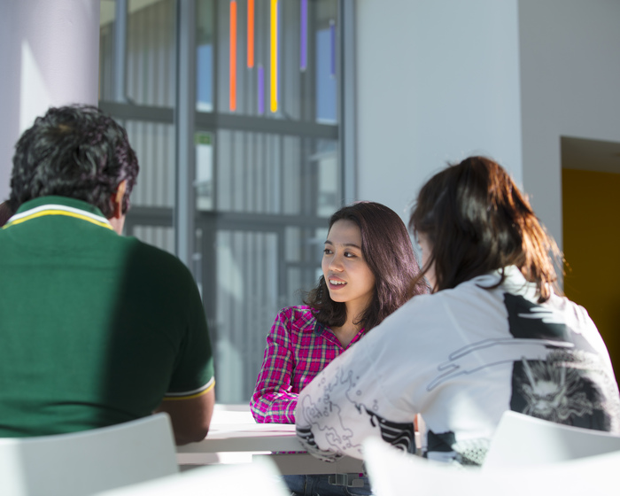 Students chatting in a seminar