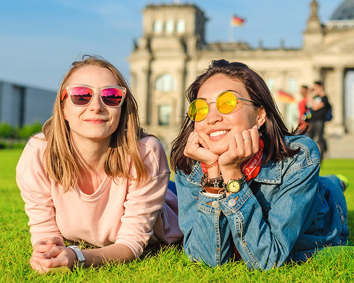 Students laying on grass in Berlin