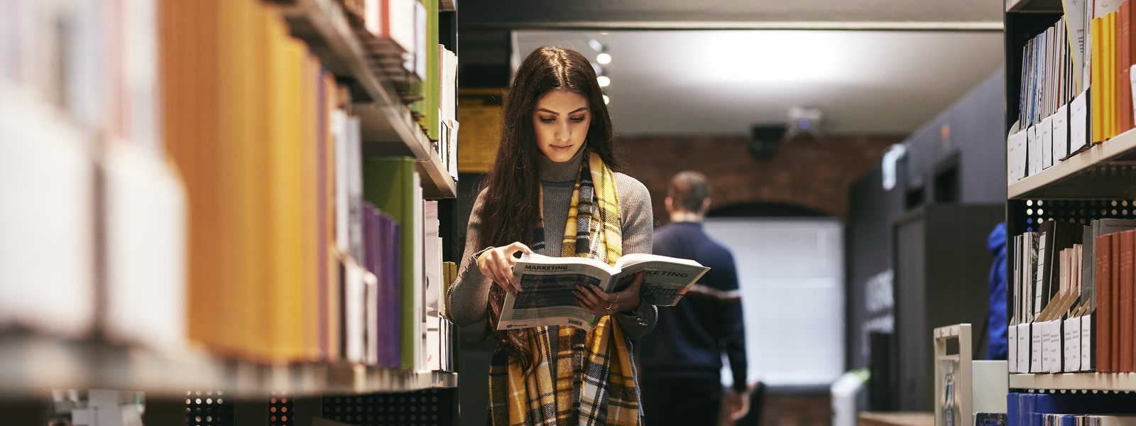 A student reading in the library