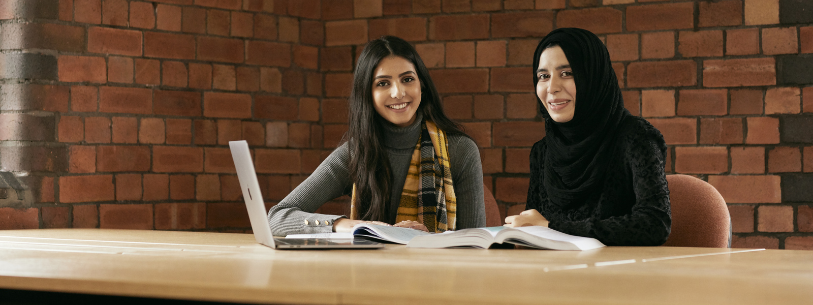 Students studying together in the library