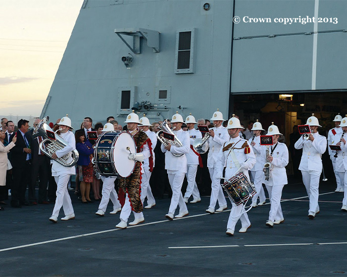 A Naval band playing on a ship