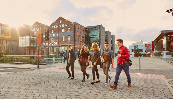 Students walking past the Great Central Warehouse Library