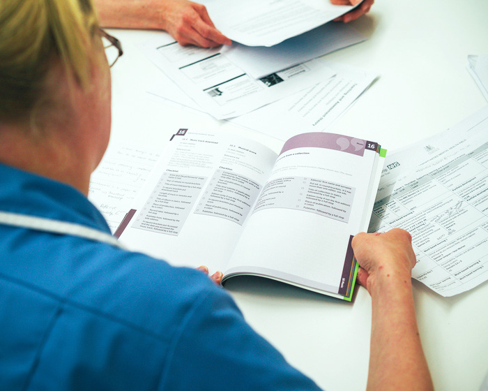 A student reading a text book