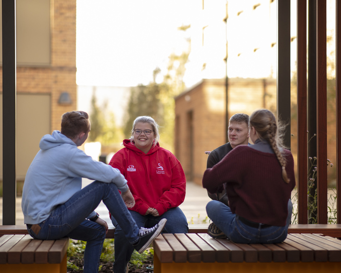 Students chatting outside their accommodation