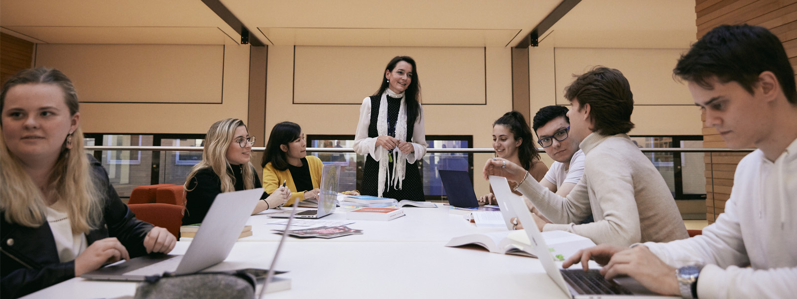 Students in a roundtable discussion in a classroom