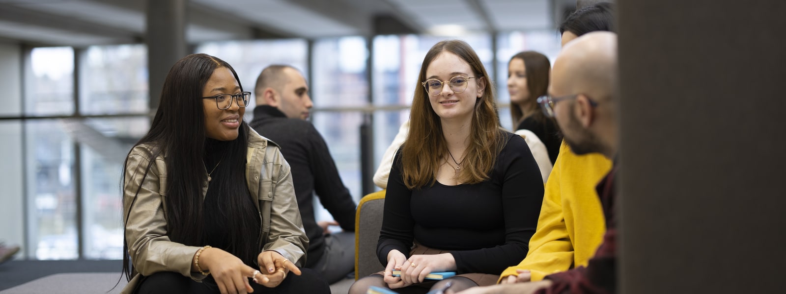 Students chatting in a learning space