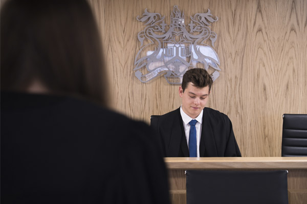 Students practising law in the moot court