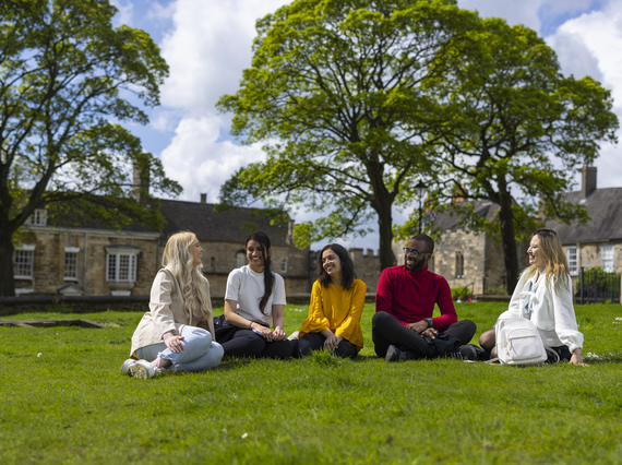 Students chatting on grass
