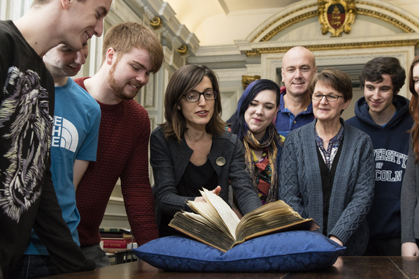 Students and staff in the Wren Library