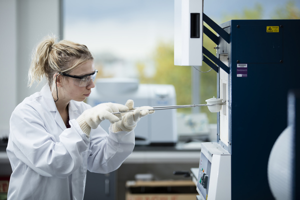 A student taking part in a practical lab session