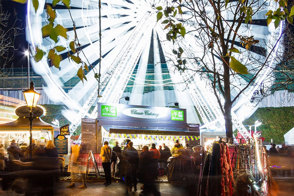 A ferris wheel lit up at the Lincoln Christmas Market