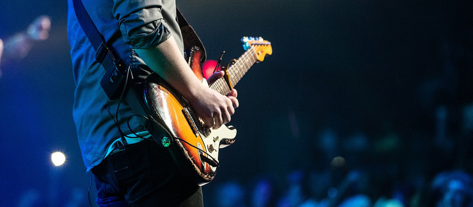 A musician playing a guitar