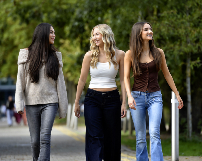 A group of students walking together on campus