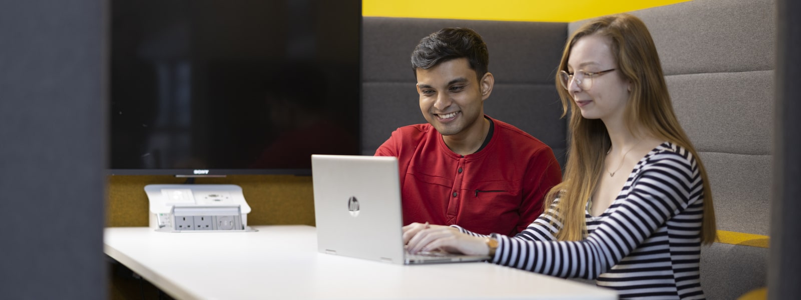 Students using a laptop