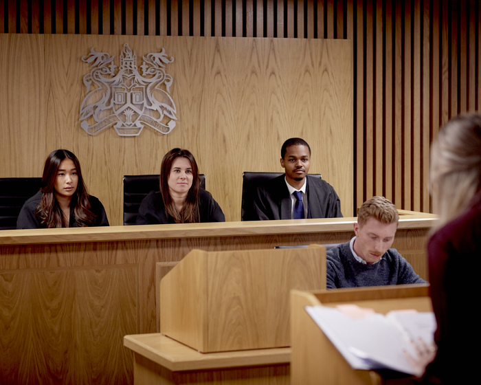 Students roleplaying in the Moot Court