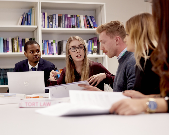 Students taking part in a Law seminar