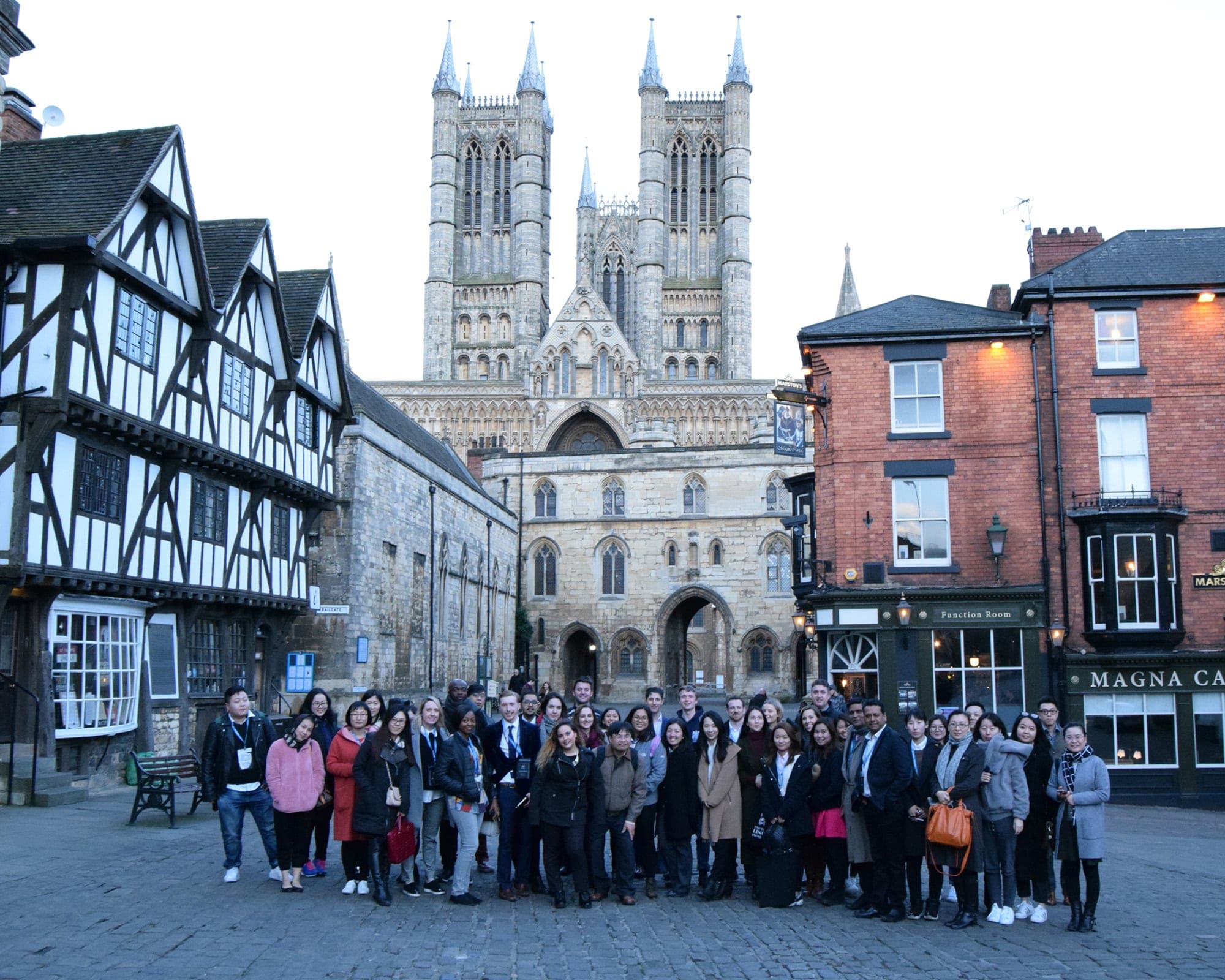 Global Representatives standing outside Lincoln Cathedral