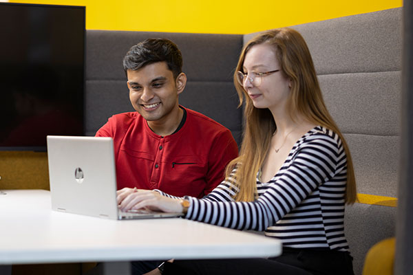 Student sitting at a laptop