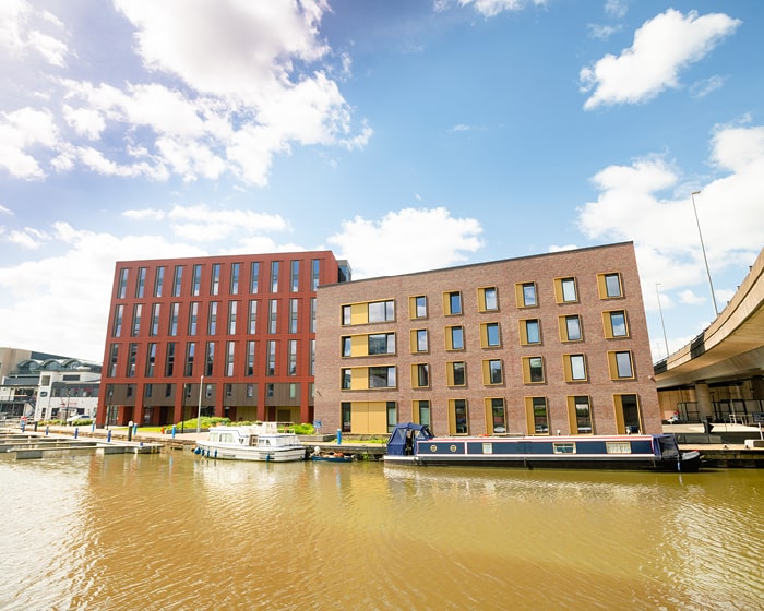 Exterior shot of two blocks at Cygnet Wharf on the front of the Brayford Pool